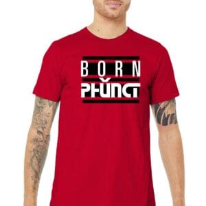 Man wearing red Born Phung graphic tee