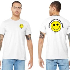 White t-shirt with yellow smiley and text