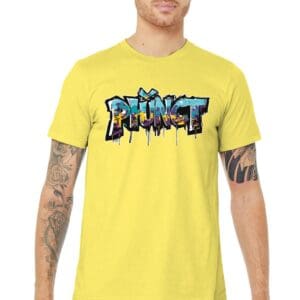 Man with tattoos wearing yellow graffiti T-shirt